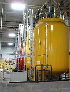 Large Yellow Chemical Storage Tank