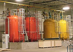 Large Yellow Orange Chemical Storage Tank